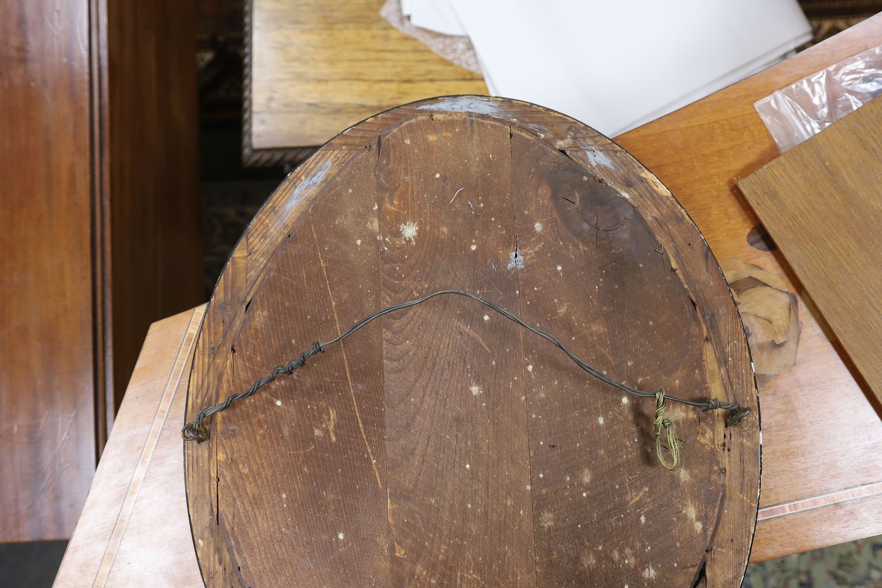 A small 19th century Irish oval wall mirror, with twin faceted and cabochon glass border, width 46cm, height 56cm
